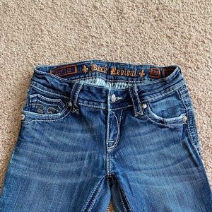 Medium wash Rock Revival jeans
